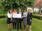 Emerald team present cheque to Chestnut Tree House